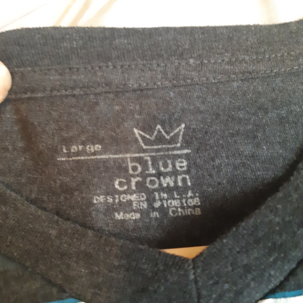 Large blue crown shirt v-neck